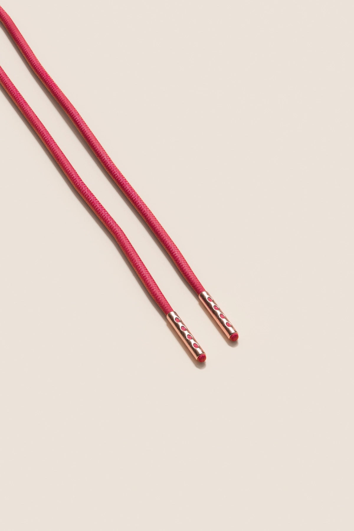 Senkels Różowy cerise 2.5mm Okrągłe Woskowane Sznurowadła with Różowe złoto Końcówki